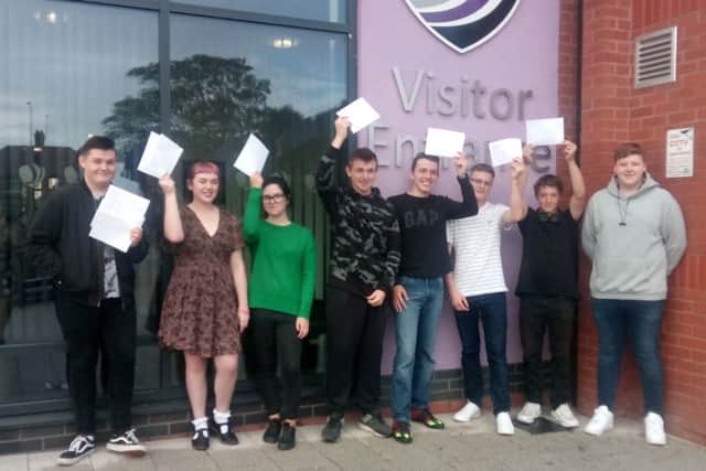 Students at Skegness Academy celebrating their GCSE results. ANL-180823-104337001