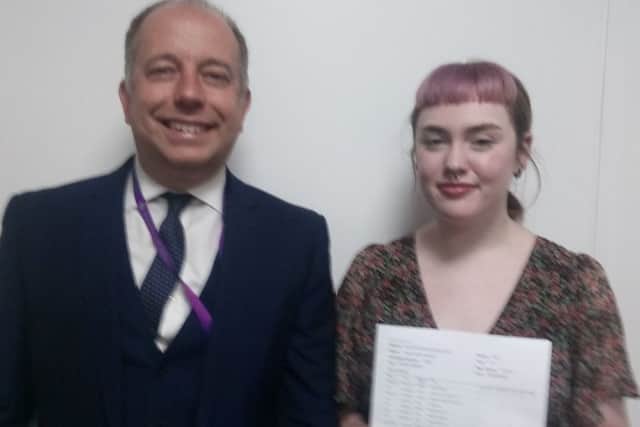 Skegness Academy headteacher Gary Carlile with student Alice Instone who is celebrating her GCSE results. ANL-180823-104029001