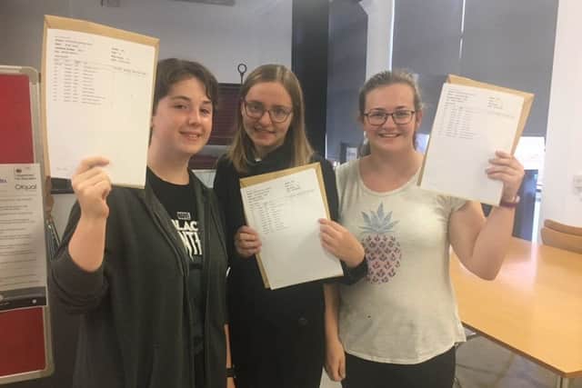 Pupils celebrating their GCSE results at KSHS