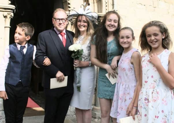 James and Helen Lascelles pictured at their wedding renewal with their four children.