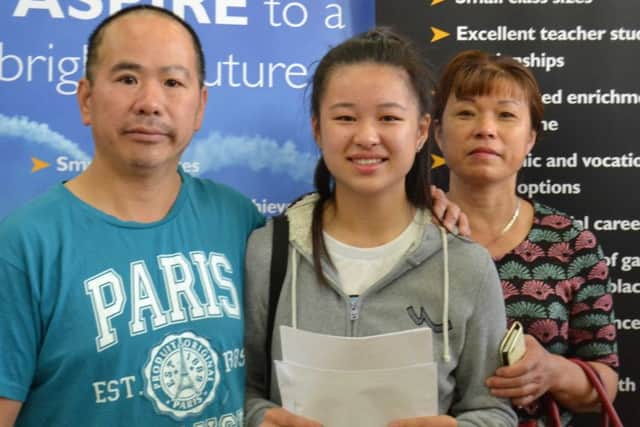 Jessica Chen from Newark with her parents
