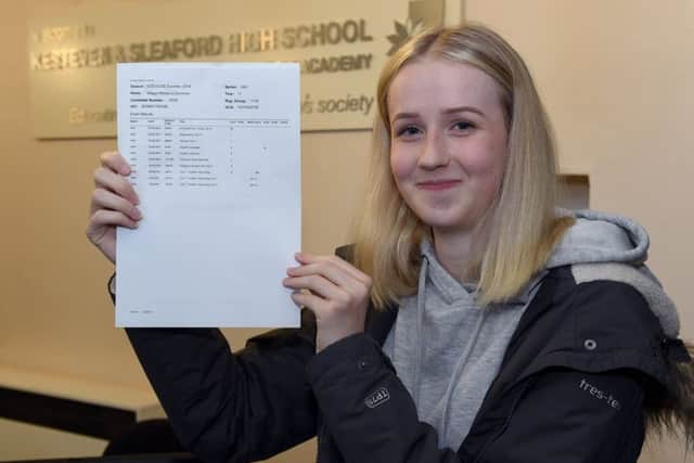 Sleafoord and Kesteven High School students collecting GCSE results. Megan Grimmer 17. EMN-180823-112052001