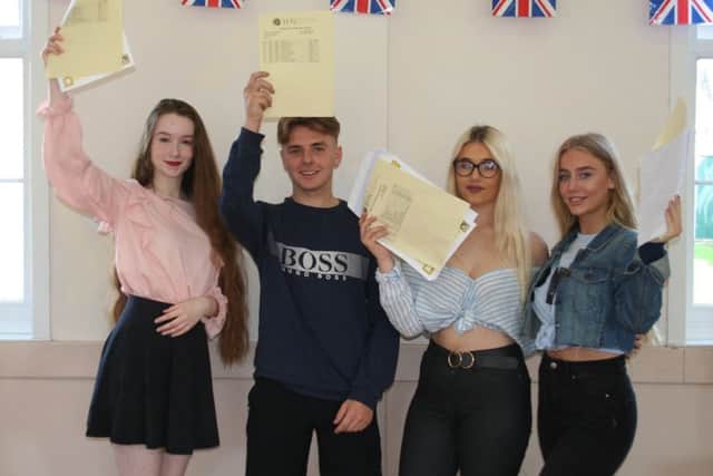 GCSE Results: John Spendluffe Technology College, Alford. These students were all smiles today, (Thursday), after picking up their GCSE results. Pictured is: Emma Chapman, Rocco D'Ambrosio, Poppy McLennan and Imogen Cahalin.