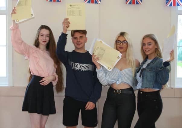 GCSE Results: John Spendluffe Technology College, Alford. These students were all smiles today, (Thursday), after picking up their GCSE results. Pictured is: Emma Chapman, Rocco D'Ambrosio, Poppy McLennan and Imogen Cahalin.