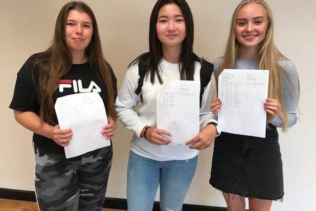 Millie Dawson, Sonia Lo and Paige Kelly celebrated their 26 GCSEs.
