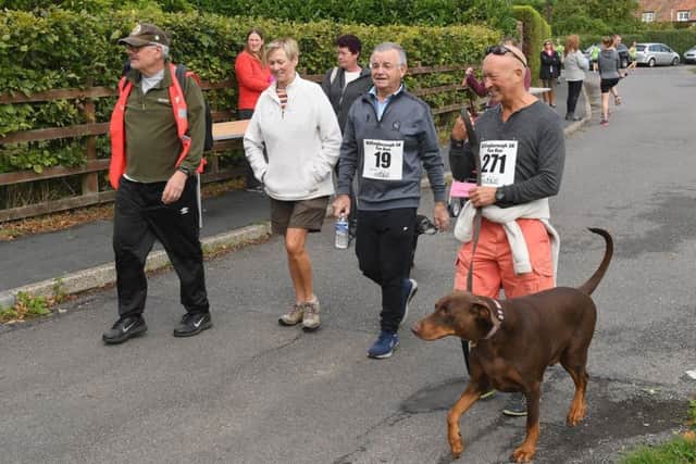 Charity 5 and 10k runs at Billingborough. Start of the 5k run. EMN-180827-155856001