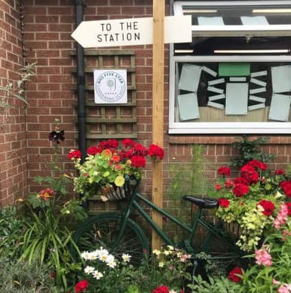 Some of the gardening work done by Ancaster Primary School in adopting their station. EMN-180830-174823001