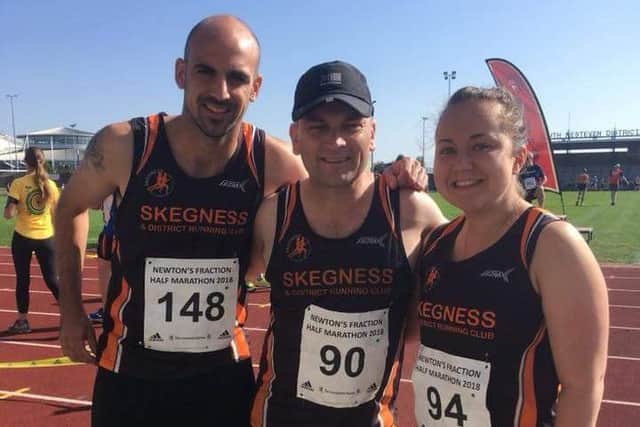 Pictured, from left, are Giles, Bob and Rebecca at Newton's Fraction half marathon. iqfrZ_UbUT0pFuL61aCm