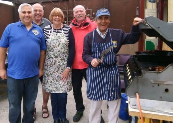 Members of Coningsby & Tattershall Lions who manned the barbecue EMN-180509-164254001