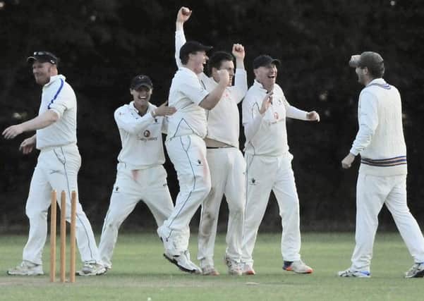 Caistor celebrate a narrow victory in their top-of-the-table clash with Nettleham EMN-180309-174515002