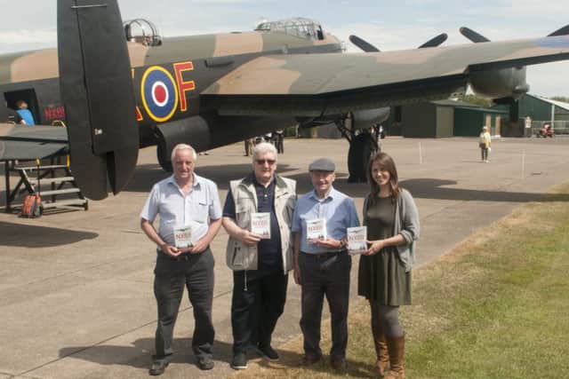 Set for the release of NX611  The Flying Years, (from left) HAPS members Alan Bridges and Richard Taylor, Just Jane owner Harold Panton, and Primetime Video DVD producer Joanna White.