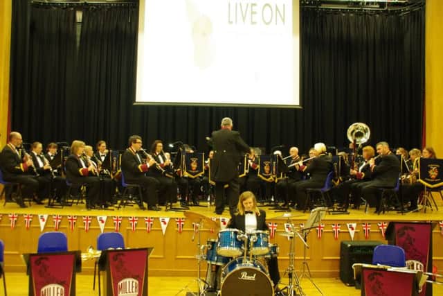 Sleaford Concert Band at last year's Poppy Prom in St George's Academy hall. EMN-180409-143638001