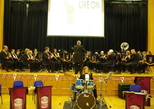Sleaford Concert Band at last year's Poppy Prom in St George's Academy hall. EMN-180409-143638001