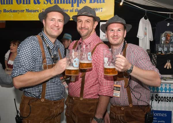 A snapshot from last year's Oktoberfest, organised by Sleaford Round Table. L-R Neil Freeman, Christian Slingsby, James Lowe - event manager.