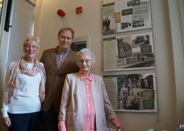 Juliette Keeping and Eileen Neal, with their nephew Duncan Kew and the boards display their own story of life at the station.EMN-180909-232501001