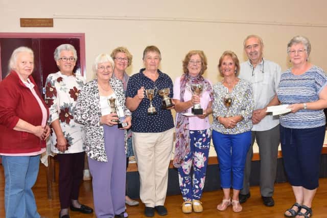 Barbara Theirs, left, with trophy winners and judges