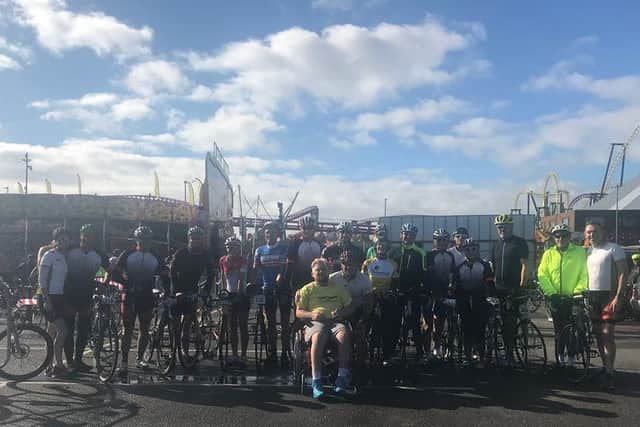 Skegness Tri Club members supporting the Riding for Ryan event at Fantasy Island, Ingoldmells, with Ryan pictured front. ANL-180909-164415001