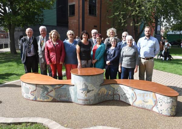 Launch of finished sculptural bench on Eastgate Green. EMN-181009-102411001