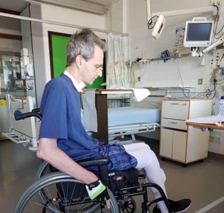 Wheelchair-bound William Tweddell in hospital.