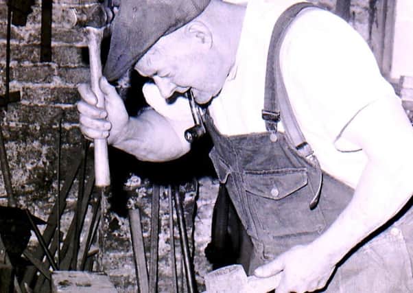Anwick blacksmith Samuel Sharman in action back in September 1969. EMN-180917-183652001