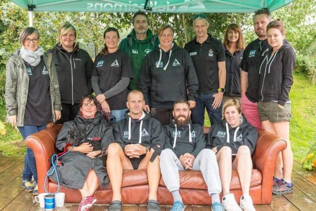 Martin and Paul (centre front) nd their support team.