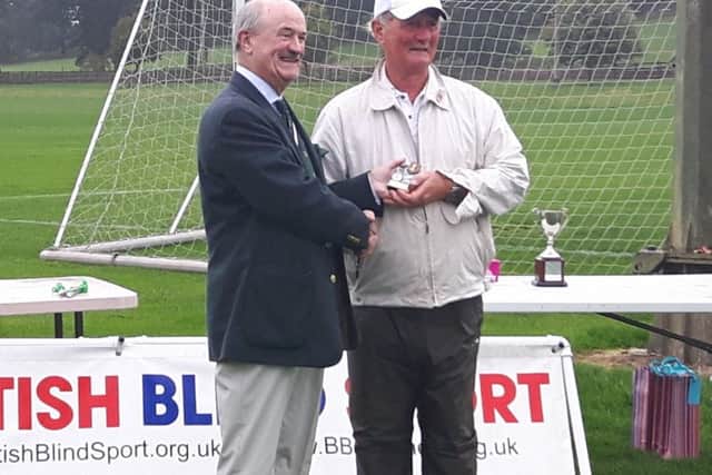 Peter Shaw collects the VI Open class gold trophy.