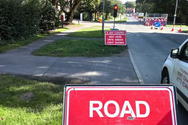 Road closed signs at Langton Hill. EMN-180913-145114001