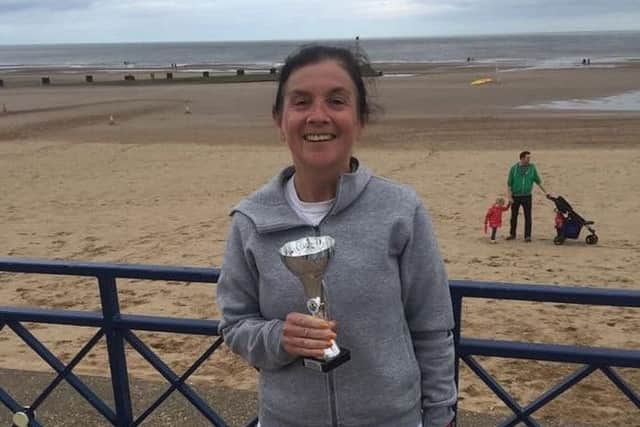 Janet Harmston with her East Coast Classic trophy for First Lady over 55.