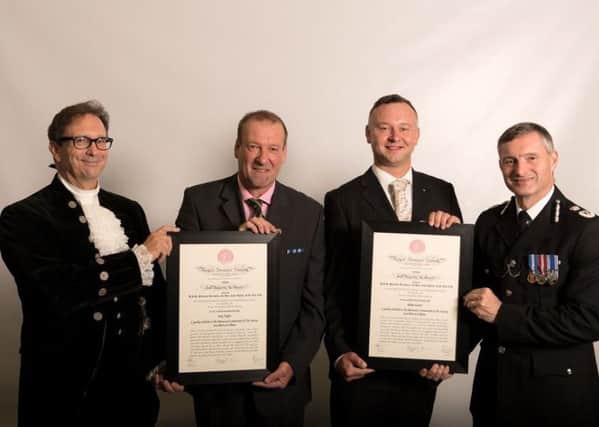 Guy Taylor and Adam Carter pictured with Ian Walter, High Sheriff of Lincolnshire, and Chief Constable Bill Skelly.