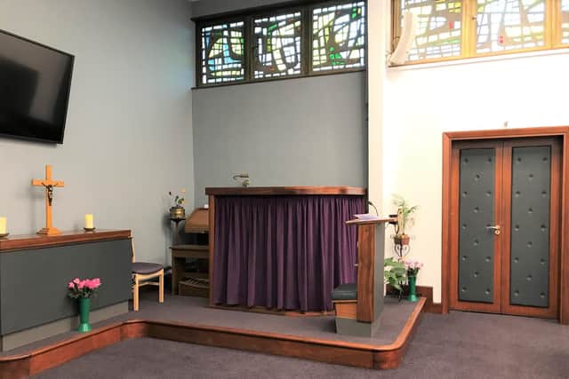 The improved pulpit at the front of the chapel