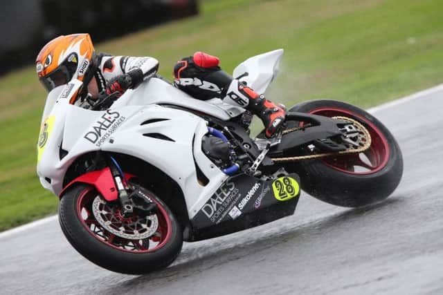 Tim Neave battles through the wet to secure a top-10 finish on Sunday EMN-180917-144100002