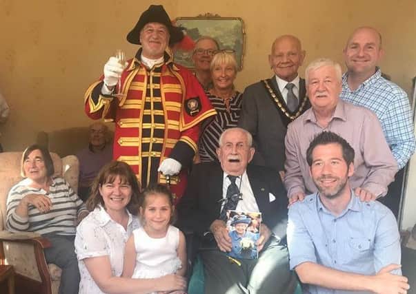 John Gill celebrating his 100th birthday with friends and family, the Mayor of Skegness Coun Sid Dennis and Town Crier Steve ODare. ANL-180917-175637001