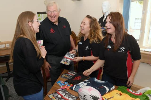 Try Something New Day at Sleaford Town Hall. L-R Harriet Tricker of Sleaford talking to Steve Gunter - president of Sleaford Rugby Club, Rebecca Grice and Rebecca Jones - vice captains of Sleaford Ladies Rugby team. EMN-180917-120814001
