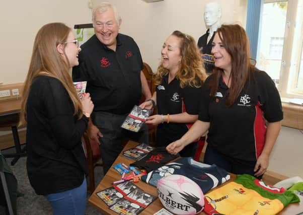 Try Something New Day at Sleaford Town Hall. L-R Harriet Tricker of Sleaford talking to Steve Gunter - president of Sleaford Rugby Club, Rebecca Grice and Rebecca Jones - vice captains of Sleaford Ladies Rugby team. EMN-180917-120814001