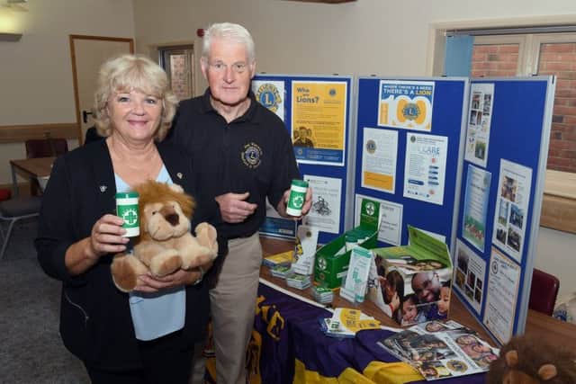 Try Something New Day at Sleaford Town Hall. Sue La Roche - Sleaford and District Lions Club president, Paul Whitworth - Lions Club member. EMN-180917-120829001