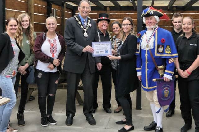 A final total of £905 was presented to a representative of the Demi Knight fund.