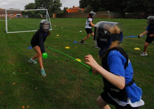 Children at Caythorpe Primary school taking part in the fencing taster class organised by Carre's Sports Outreach scheme. EMN-180925-103352001