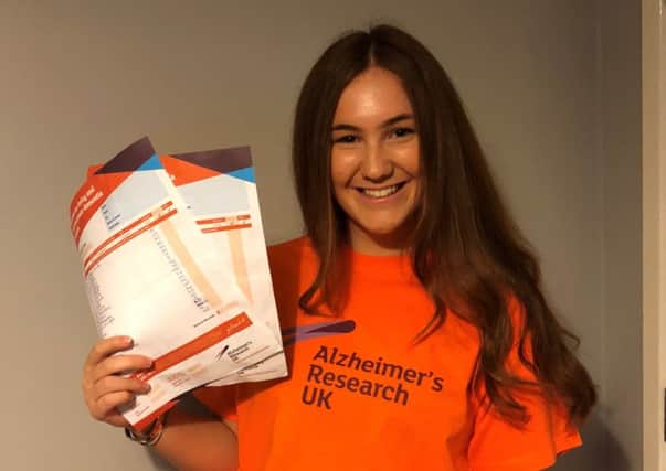 Evie Shaw will brave a 165ft abseil to support Alzheimers Research UK and the Alzheimers Society.