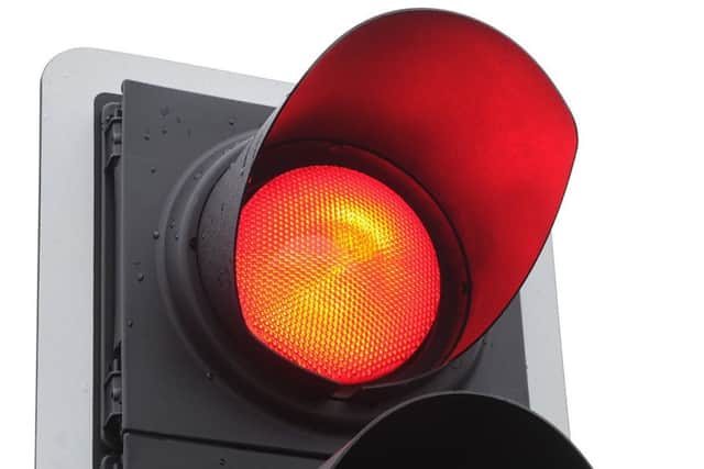 Seeing red: A Horncastle town councillors claims traffic lights at the Bull Ring junction are behind delays