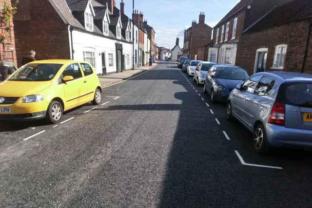 The freshly painted bays in a re-surfaced West Street where it is claimed residents are struggling to park.