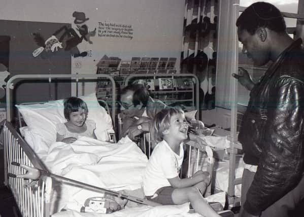 Lenny Henry meeting fans on the children's ward at Boston's Pilgrim Hospital in 1983.