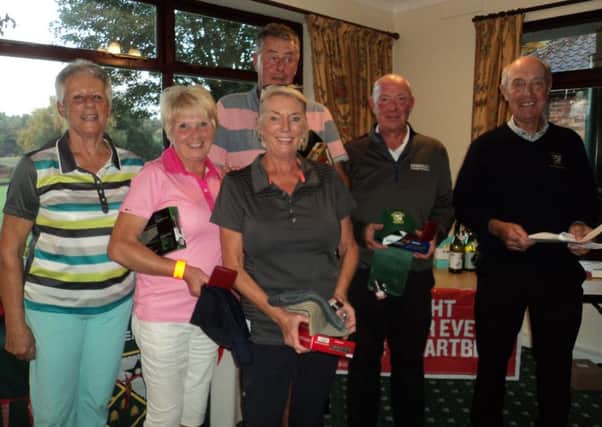 From left, ladies' captain Jenny Holborn, Tilly Lawrence, Steve Hewish, assistant manager Kim Robinson, finance director Colin Law, and men's captain Ian Ribey EMN-180919-163153002