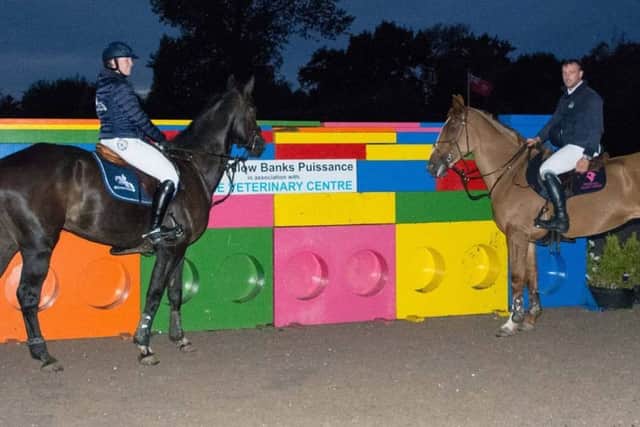 Joint winners Chelsea Skelton and Joss Williams in front of the 1.92m wall they both cleared EMN-180919-172453002