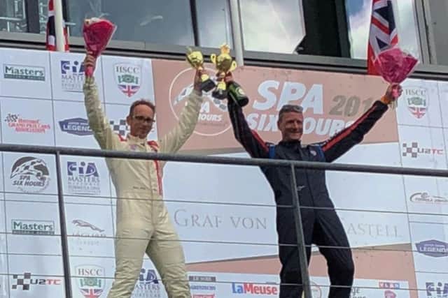 Shaun Balfe (left) and Andy Wolfe celebrate second place in the Historic Touring Car Championship EMN-180920-113252002
