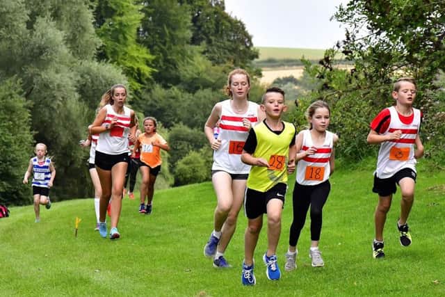 Junior runners takes on the secnic, but hilly course PHOTO: Graham Stephenson EMN-180920-144502002