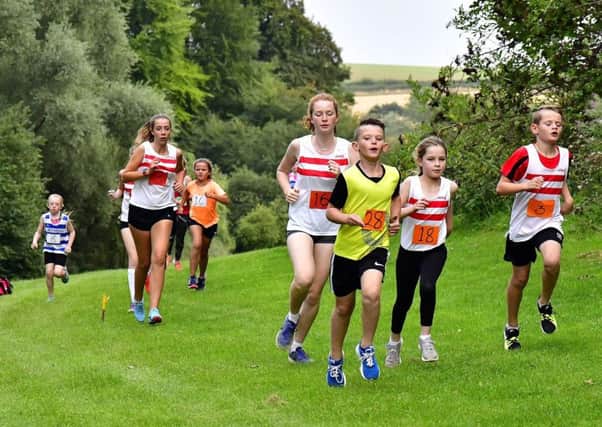 Junior runners takes on the secnic, but hilly course PHOTO: Graham Stephenson EMN-180920-144502002