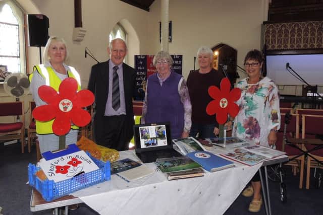 Mayor of Sleaford, Coun Grenville Jackson with members of Sleaford in Bloom, from left - Linda Brooker, Ada Trethewey - chairman, Linden Bailey and Pauline Dobson. EMN-180924-172924001
