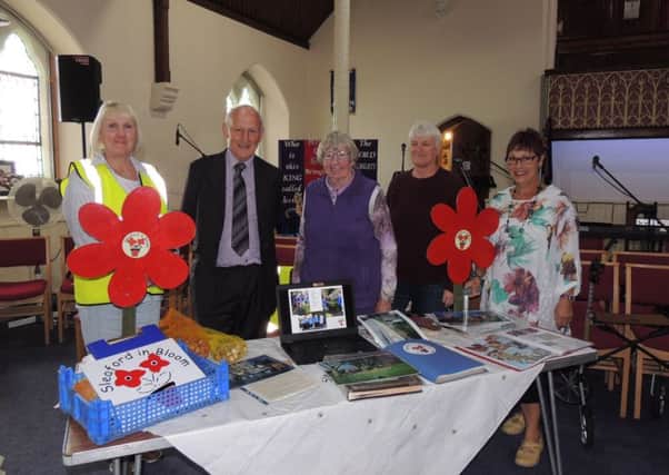 Mayor of Sleaford, Coun Grenville Jackson with members of Sleaford in Bloom, from left - Linda Brooker, Ada Trethewey - chairman, Linden Bailey and Pauline Dobson. EMN-180924-172924001