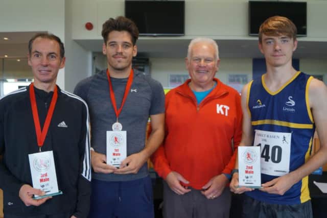 Race director Keith taylor with the male winners of the Rasen 10k; from left, Gavin Monks, Ryan Morris and Sebastien Vicary EMN-180924-065444001