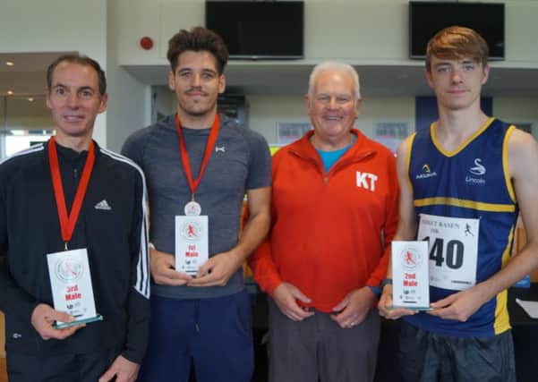 Race director Keith taylor with the male winners of the Rasen 10k; from left, Gavin Monks, Ryan Morris and Sebastien Vicary EMN-180924-065444001